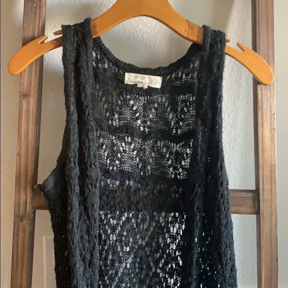 Black sweater vest with fringe